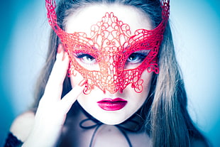 woman wearing red half-face mask