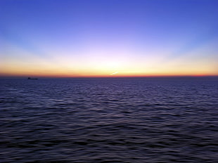 photo of ocean water during sunset HD wallpaper