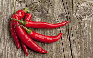 selective focus photograph of red chili pepers HD wallpaper