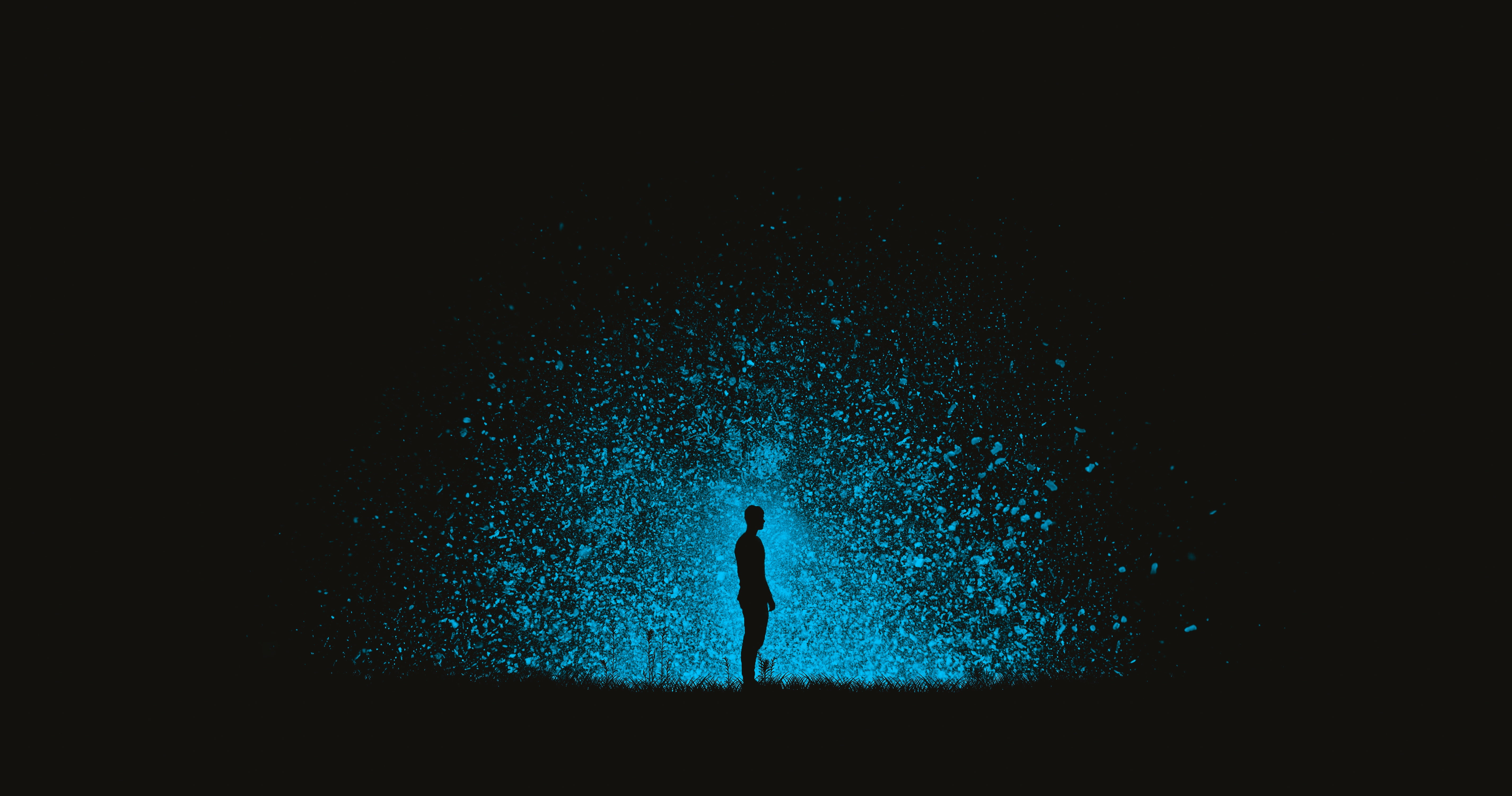 silhouette of man with blue background