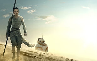Star Wars BB-8 and woman character walking on desert under clear blue sky HD wallpaper