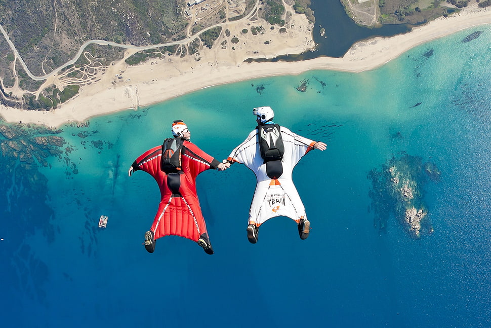 black and white helmets, skydiving, skydiver, beach, sea HD wallpaper