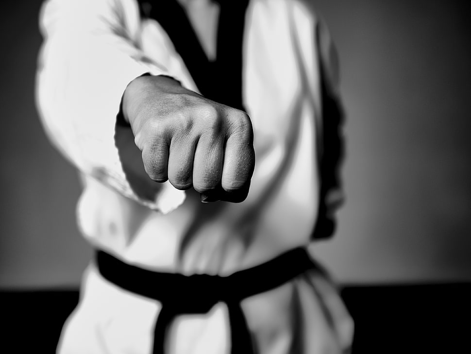 selective focus photo of a man showing right fist HD wallpaper