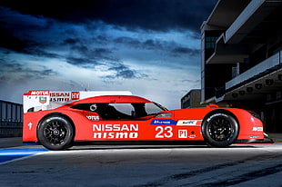 red Nissan racing car HD wallpaper