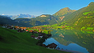 photo of village near lake HD wallpaper