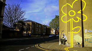 yellow flower graffiti, street, graffiti, Banksy, flowers
