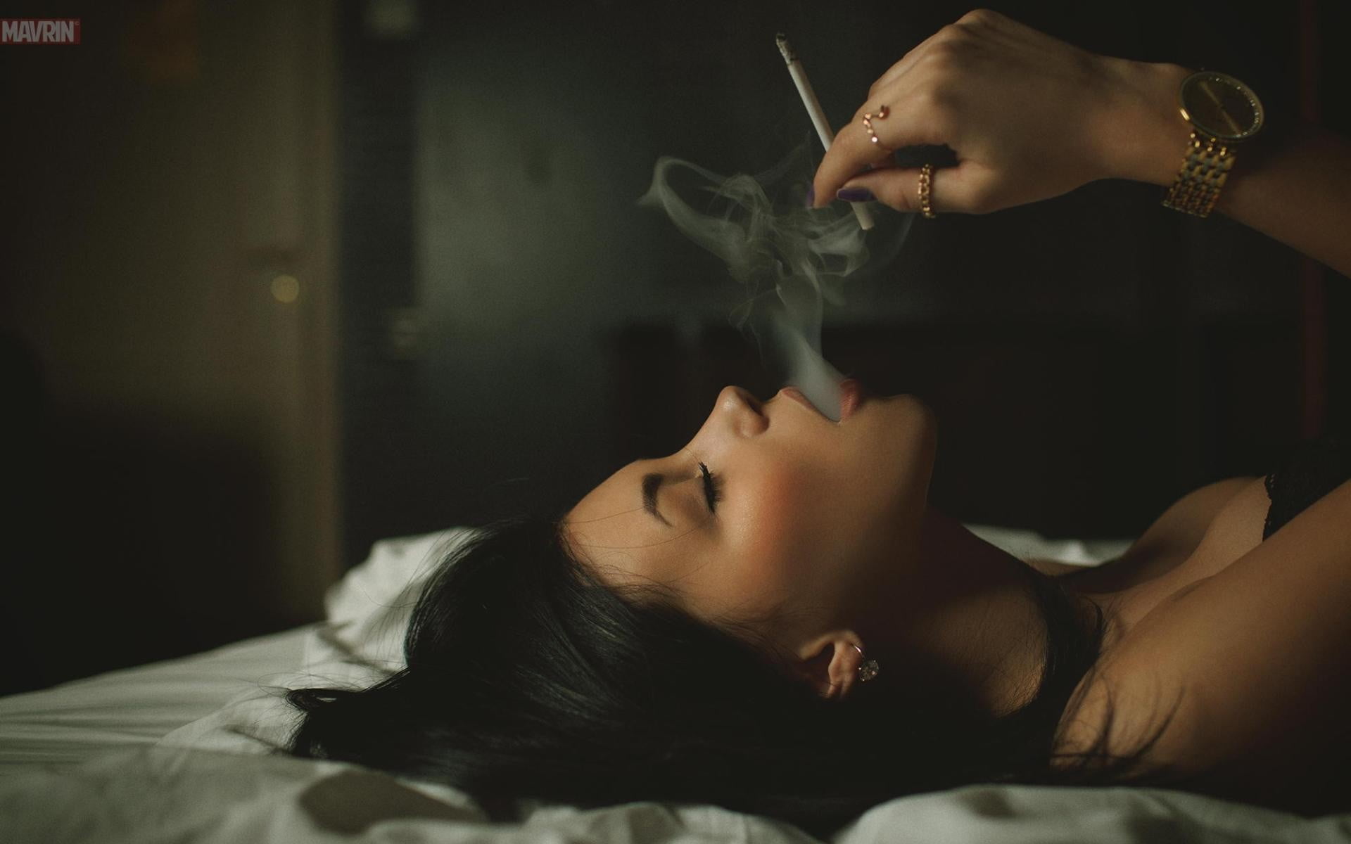 woman smoking while lying on bed HD wallpaper.