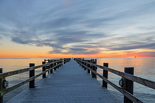 black dock during sunset