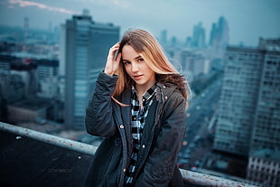 women's black full-zip jacket, women, blonde, portrait, cityscape