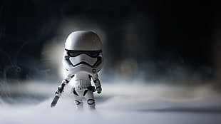 selective focus photography of storm trooper bobble head