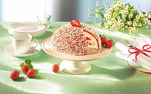 strawberry cheesecake on cake stand