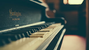 focus photography of piano