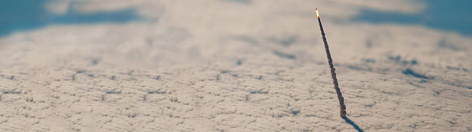 black stick on surface HD wallpaper
