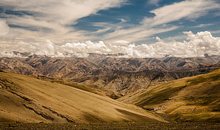 photo of mountain range landmark and clouds HD wallpaper