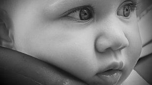 grayscale photo of a baby