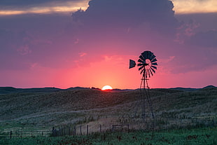 windmill surrounded with green grass, nebraska