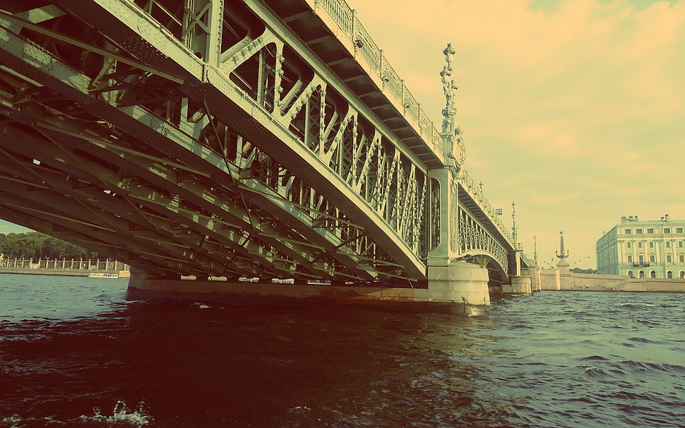 white suspension bridge under calm sky during daytime HD wallpaper