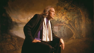 painting of man in black coat and pants