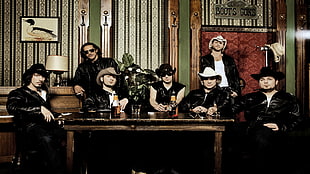seven men wearing black leather jacket