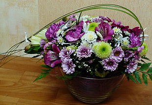 purple and yellow artficial flower decor