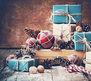 several gift boxes, Christmas ornaments , snow, presents, pine cones HD wallpaper