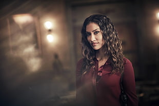 woman wearing red collared shirt