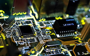 shallow focus of black and green circuit board