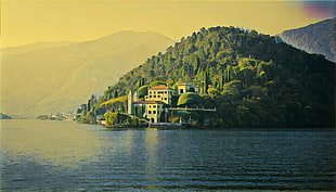 house near mountain on body of water, filter, photography, mansions, water