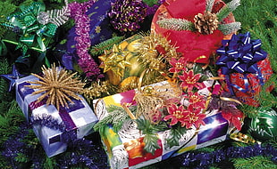 several assorted-color gift box near Christmas tree