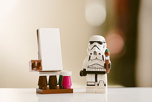 Star Wars Lego stormtrooper holding paint brush