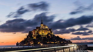 timelapse photo of castle surrounded by body of water near the bridge, mont saint michel HD wallpaper