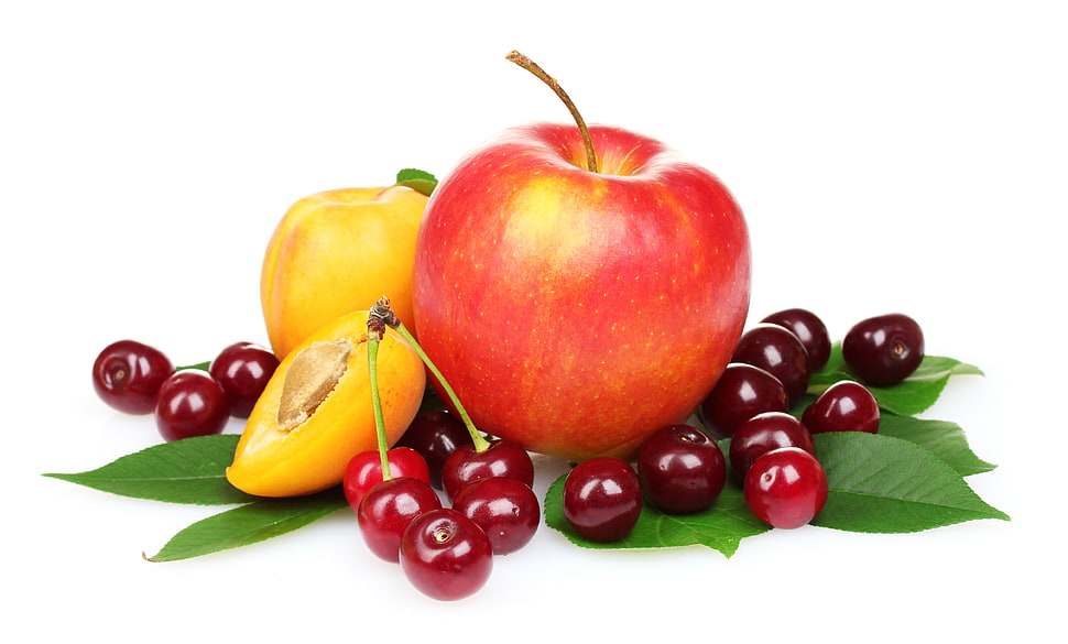 red apple and red cherries HD wallpaper