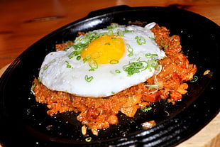 stir-fry minced meat top with fried egg