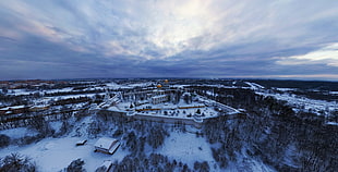 aerial photography of village filled with snow