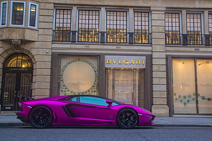 purple sports car in front of Bulgari store facade