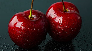 photo of tow red apples