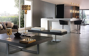 rectangular brown table and white reception desk