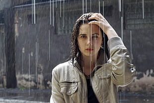 woman in gray leather zip-up jacket during rainy day
