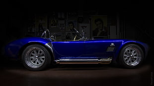 photo of blue classic convertible coupe