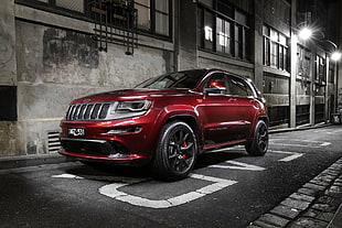 red Jeep sport utility vehicle