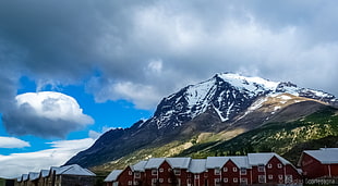mountain covered with snow under cloudy sky during daytime, las torres
