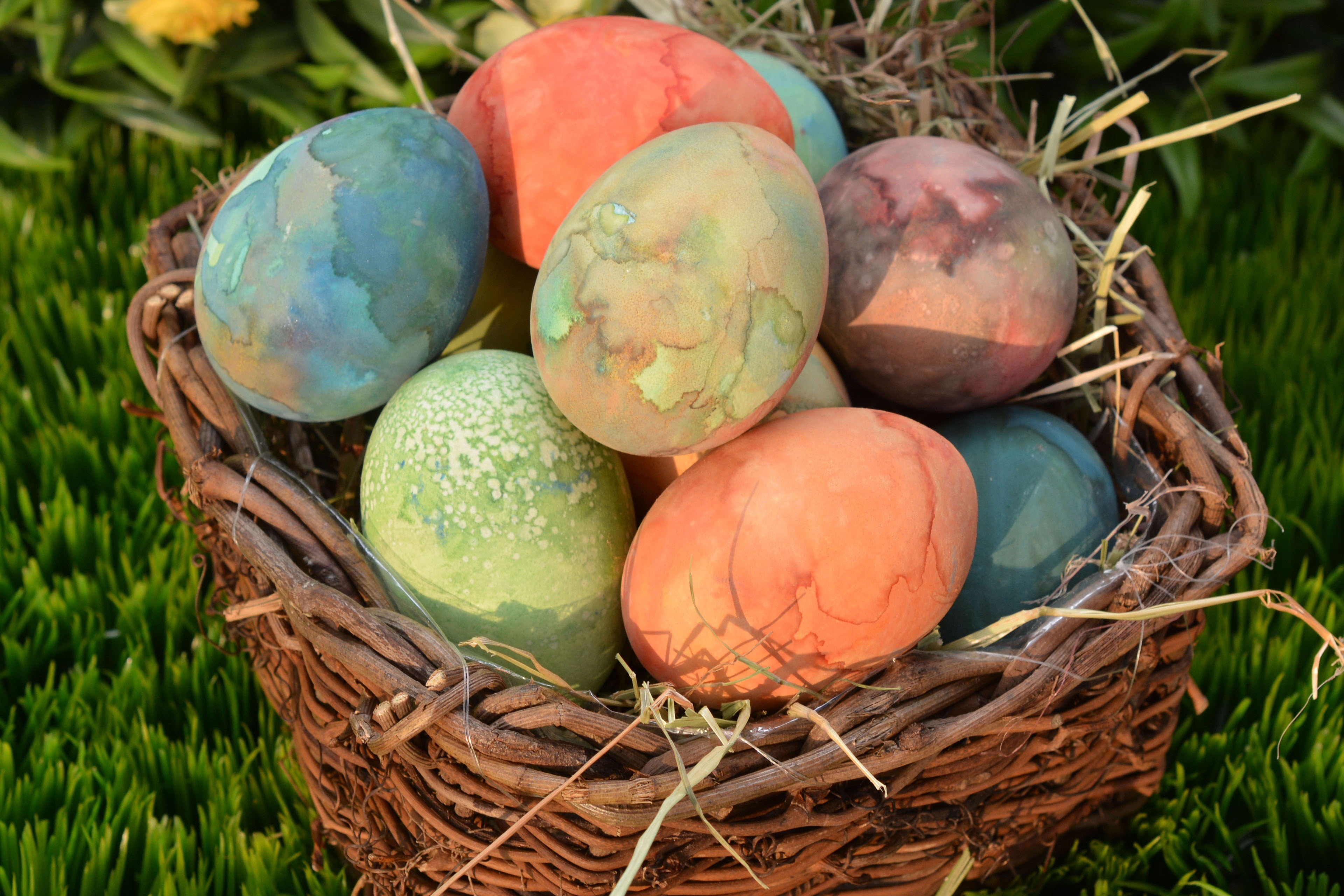 Easter eggs in brown wicker basket