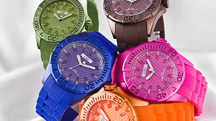 five assorted color of analog watches