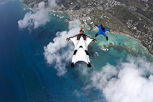 two skydivers gliding on sky, photography, sky, clouds, wingsuit