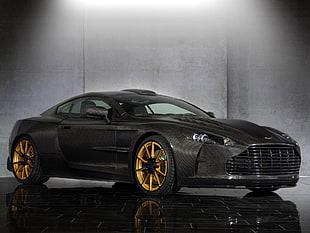 gray Aston Martin sports coupe