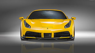 yellow Ferrari super car
