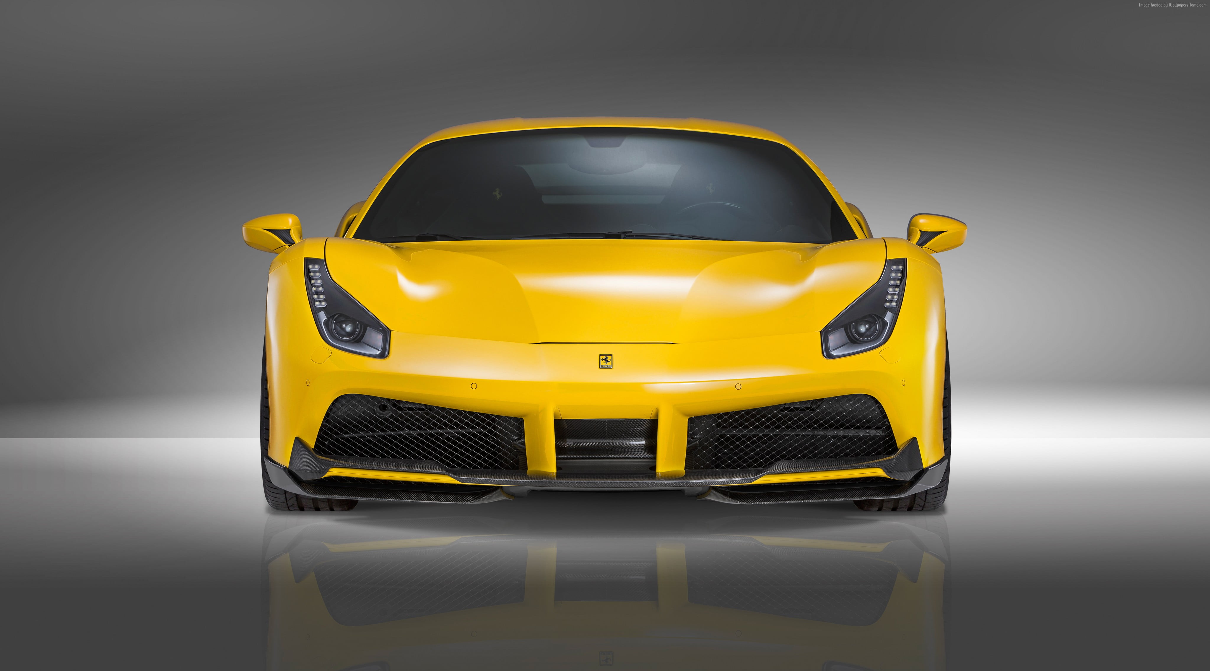yellow Ferrari super car