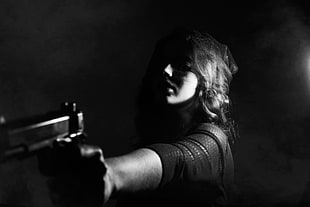grayscale photography of woman holding semi automatic pistol HD wallpaper