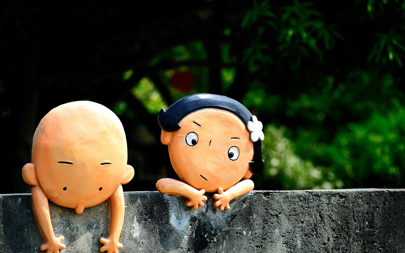 boy and girl on wall