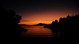 silhouette of mountain, sunset, nature, trees, water